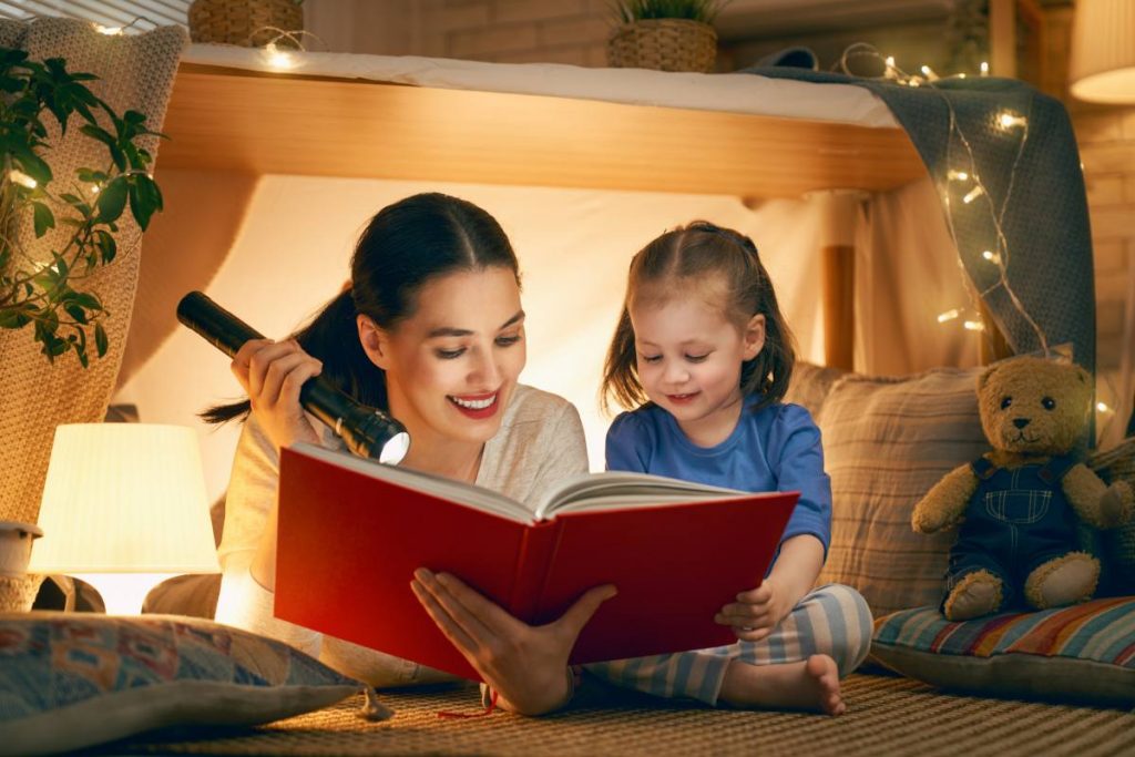 Girl enjoys playing with co-parent mother during summer visitation