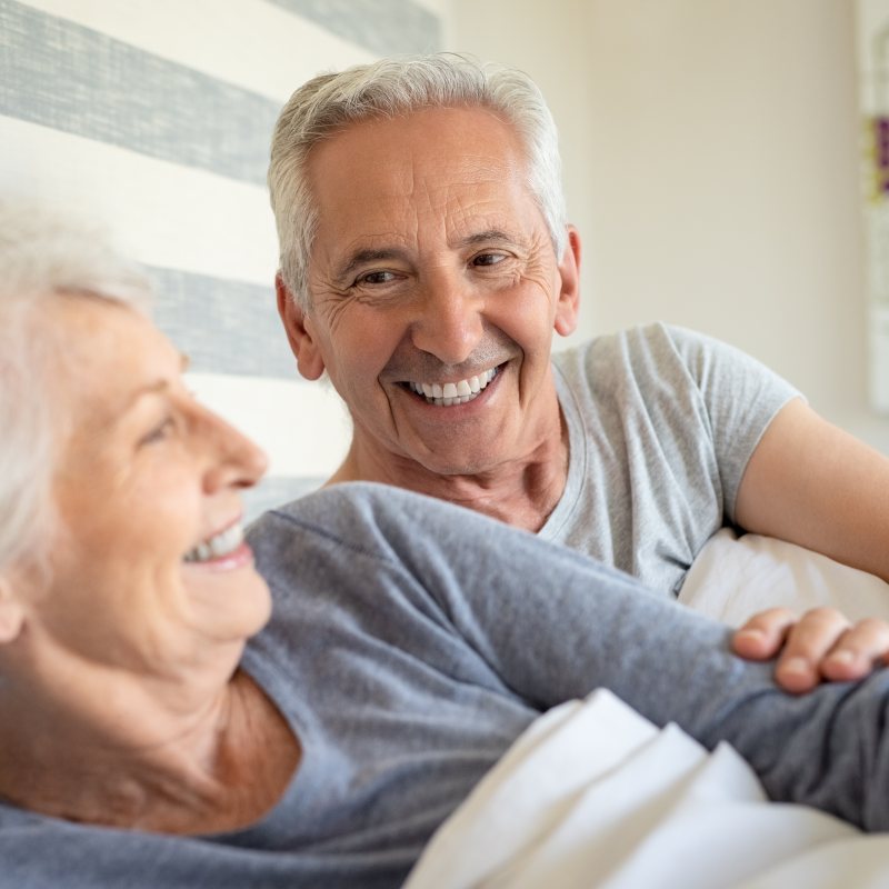 Happy Senior Couple in Bed