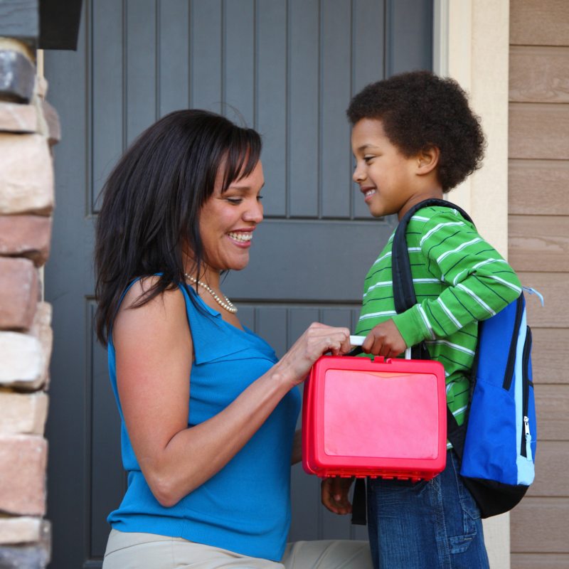 Mother Gets Child Ready for School